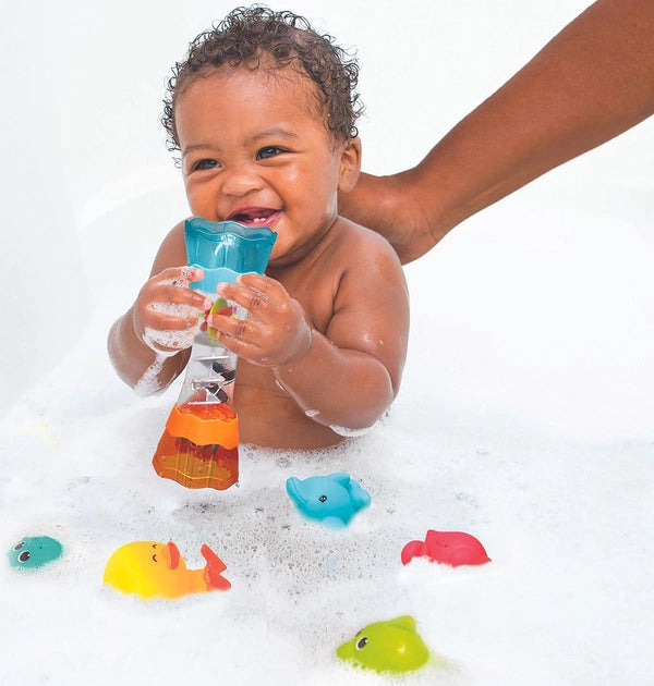 Photo of a young child playing with the Infantino Splish & Splash Bath Play Set.