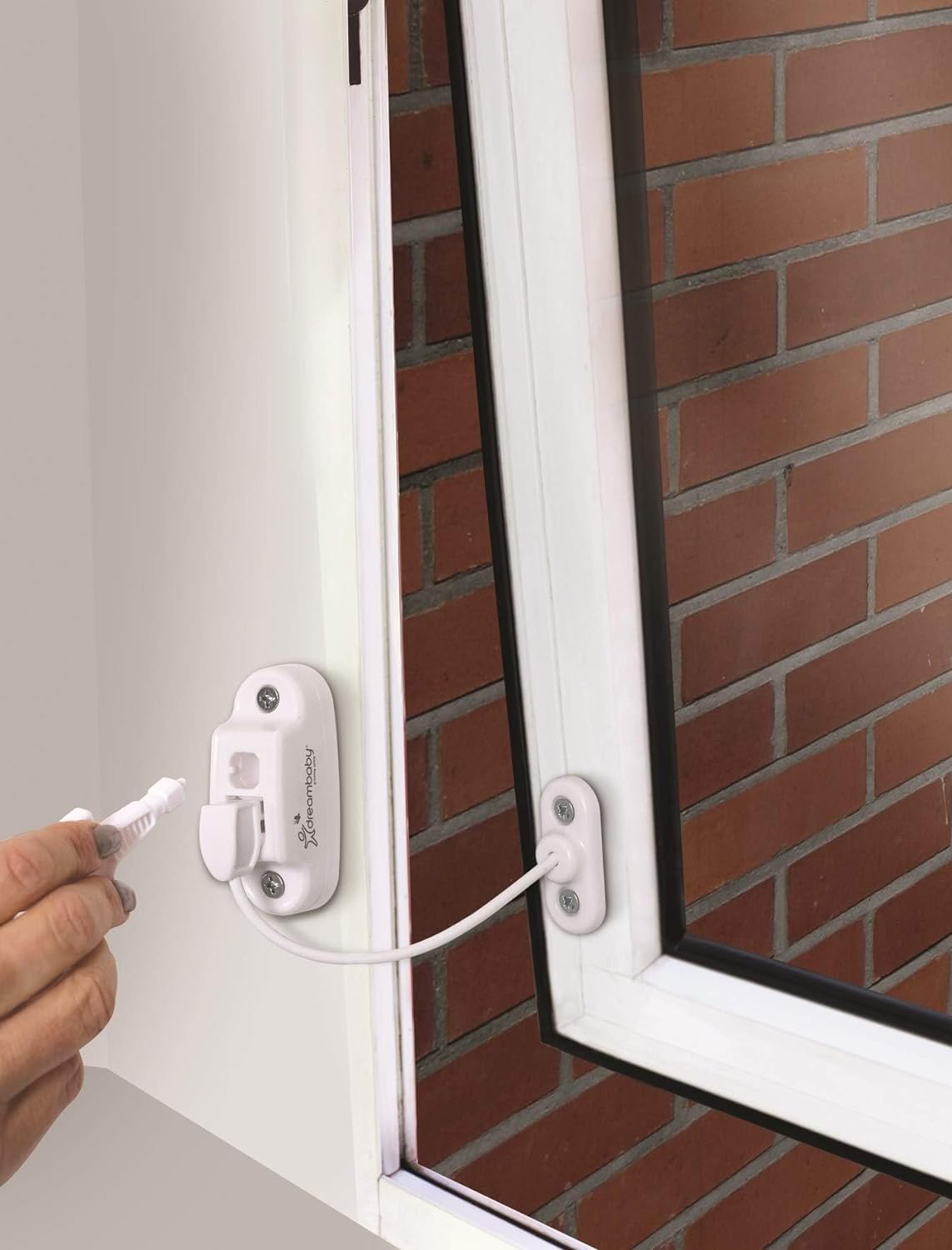 Photo of Dreambaby Breezz-lock Keyed Window Restrictor attached to an opening window.