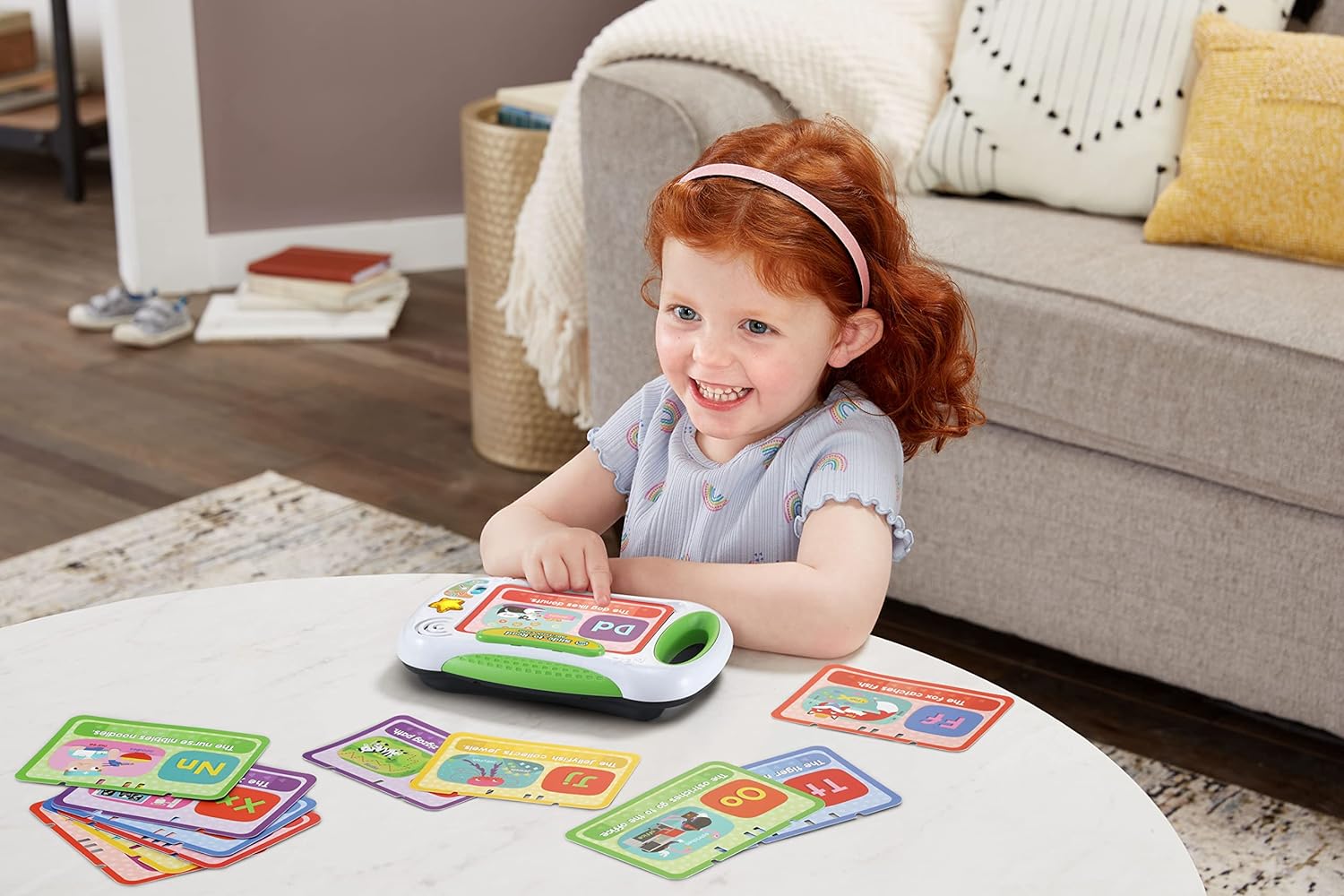 Young child playing with the Leapfrog Slide to Read ABC Flash Cards