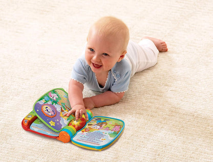 Photo of a young child playing with the VTech Baby Musical Rhymes Book