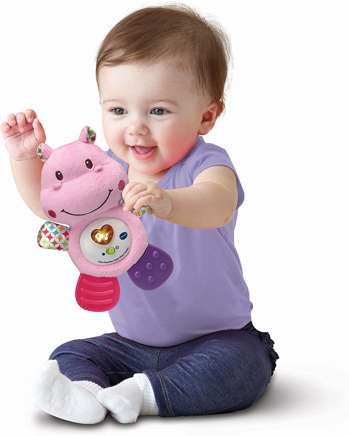 A young child playing with the Vtech Little Friendlies Happy Hippo Teether (Pink)