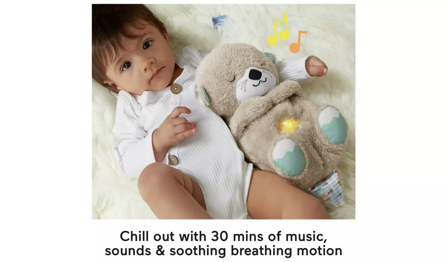 Photo of young child with plush otter soother - Chill out with 30 mins of music, sounds & soothing breathing motion.