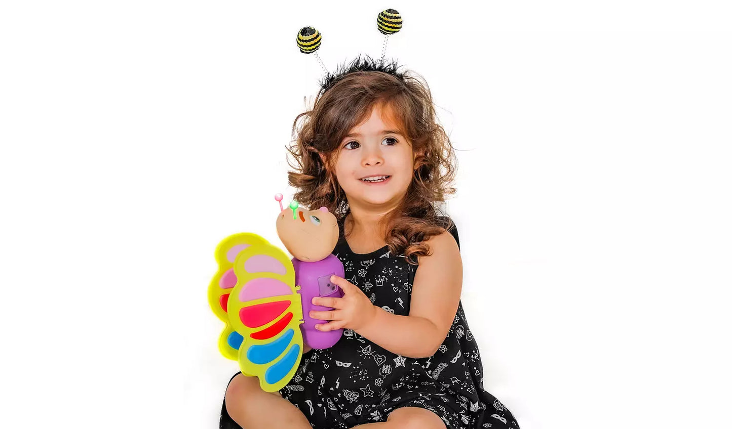 Stock photo of a young child playing with the Smarty Flutter Electronic Learning Toy